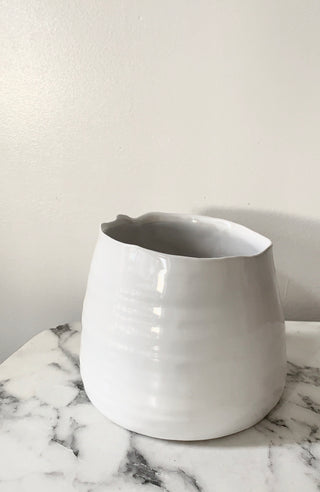 Slanted white pot