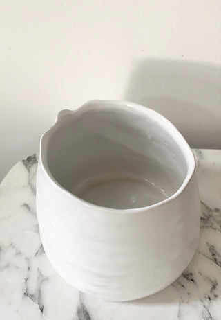 Slanted white pot